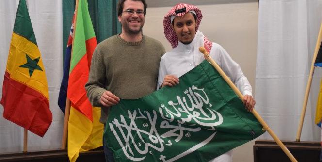 Students holding Saudi Flag